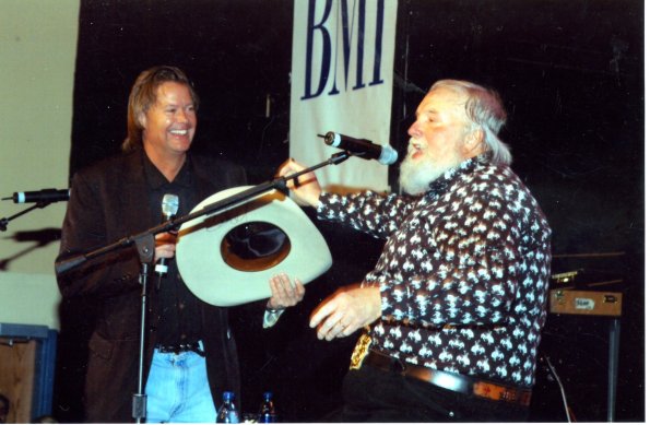 Auctioning off Charlie Daniels hat